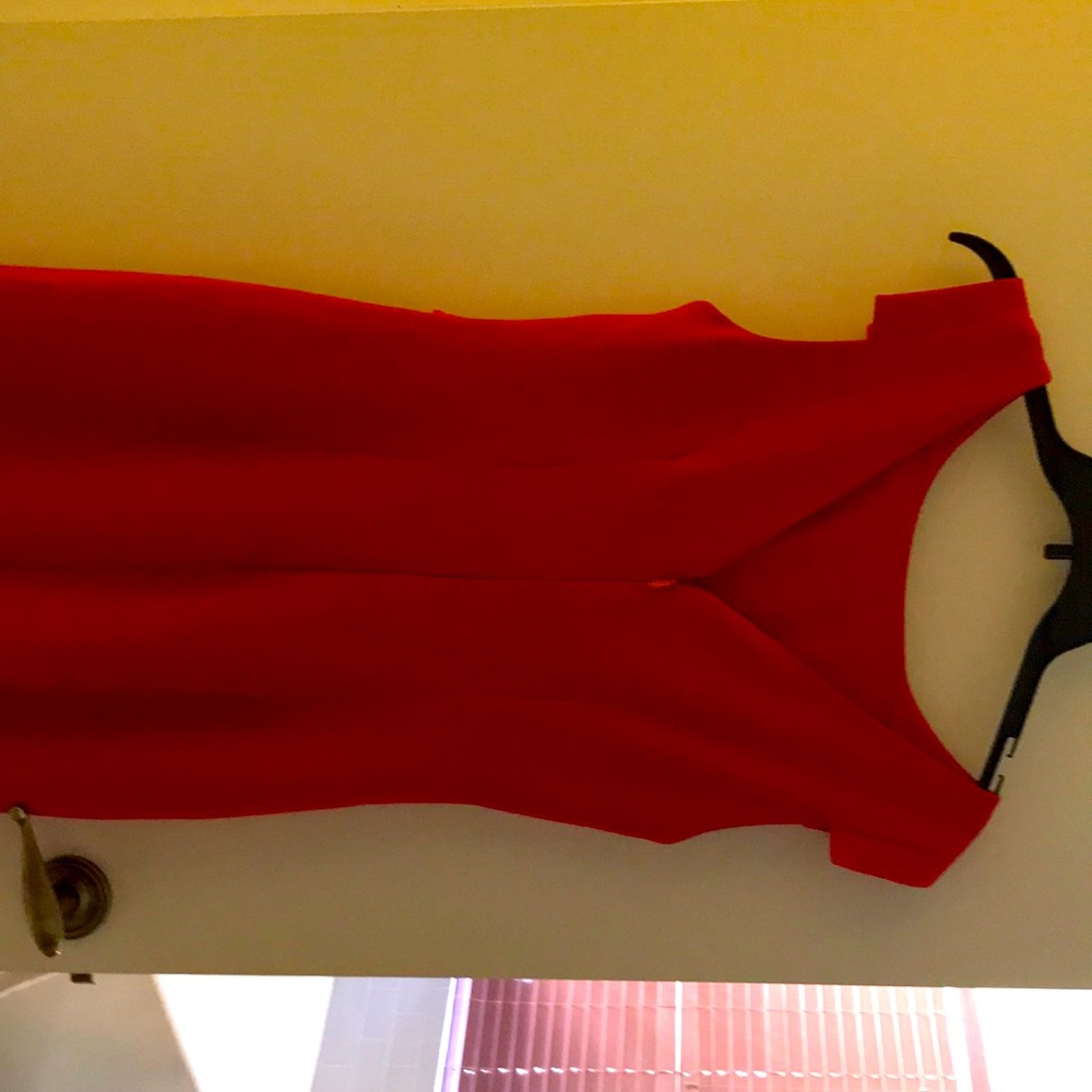 This dress is by Eva Mendez with soft inner lining